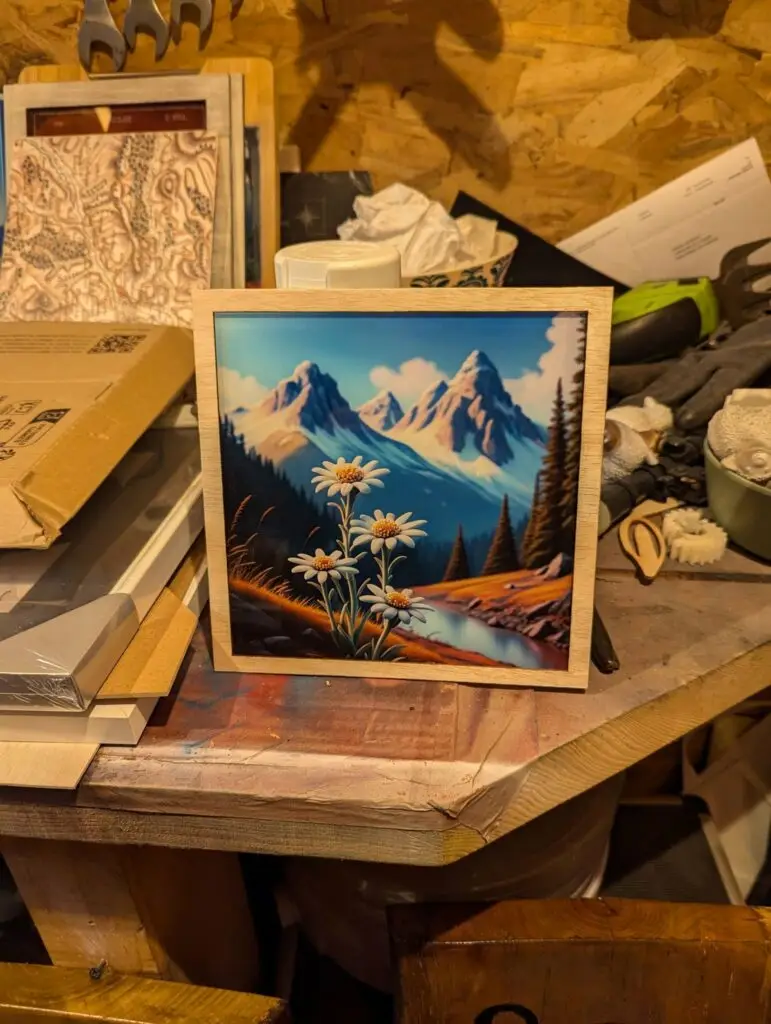 gravure fleurs et montagne